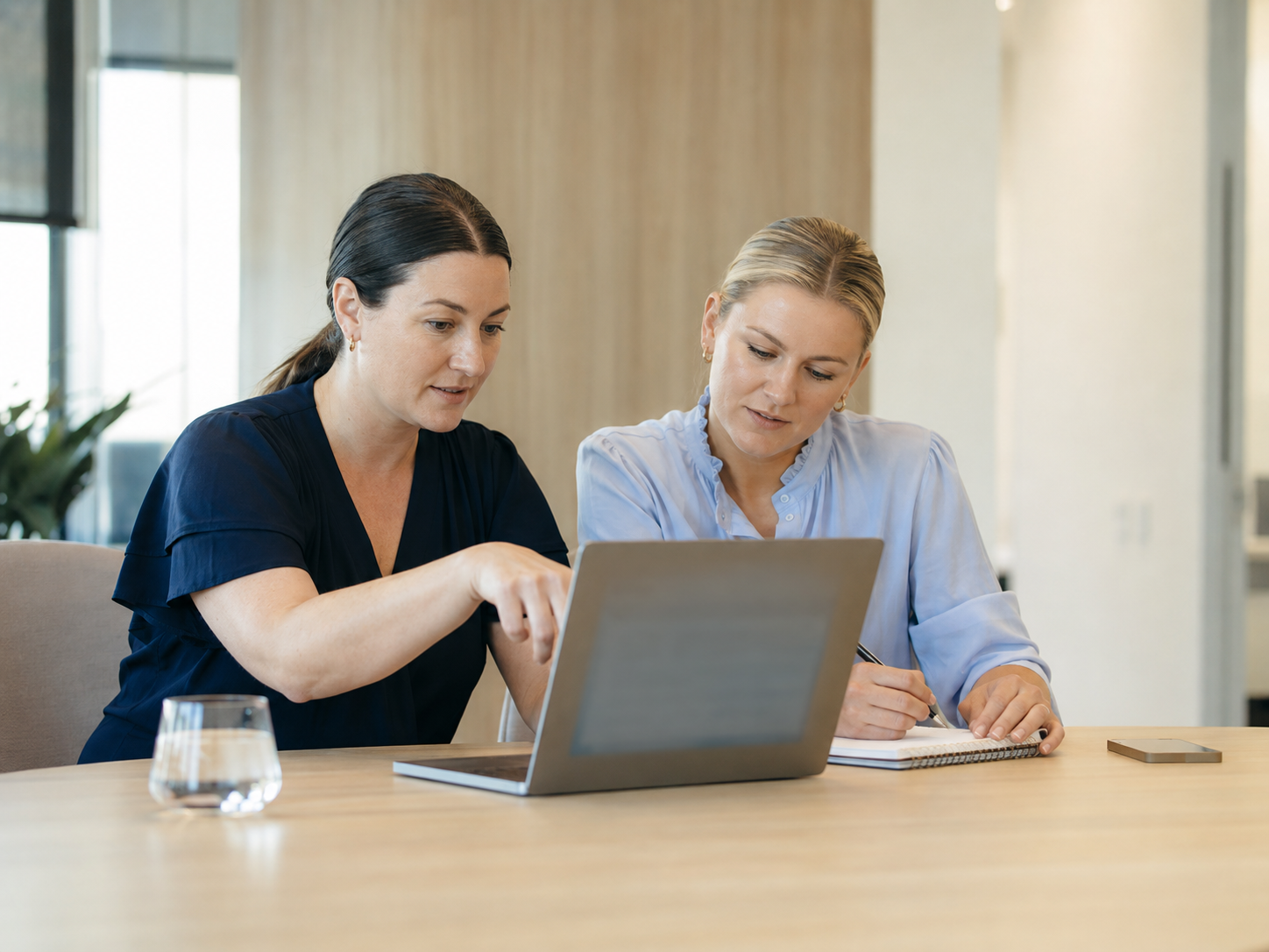Law firm team reviewing intake details together